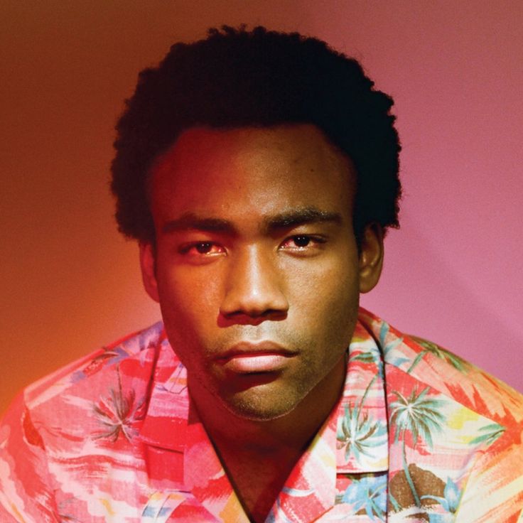 
            Album cover for Childish Gambino's album, Because The Internet, which features Donald Glover in a hawaiian shirt with pink lighting and background