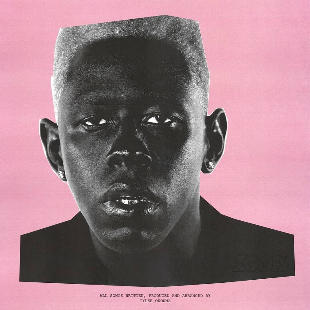 Cover of Tyler the Creator's album IGOR where Tyler is pictured in black and white with a pink background.